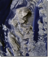 A camera on board NASA's Mars Reconnaissance Orbiter shows this exquisite colour image of the Martian surface giving a tantalising glimpse into the Red Planet's watery past.  (AP Photo/Science)